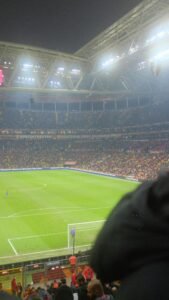 Large soccer stadium during an evening match